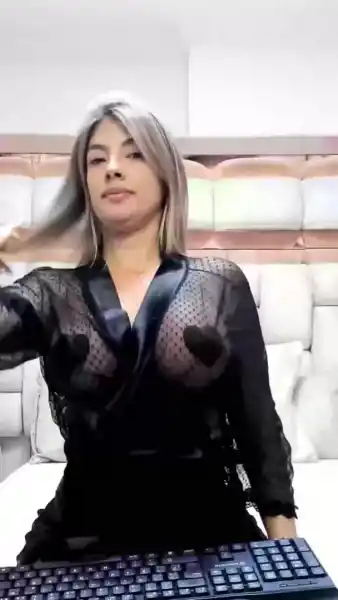 Watch this captivating short clip showcasing her alluring charm and playful moves.