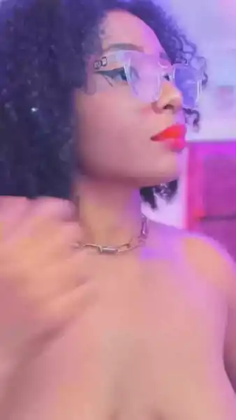 Watch this stunning performance that highlights her captivating charm and allure.