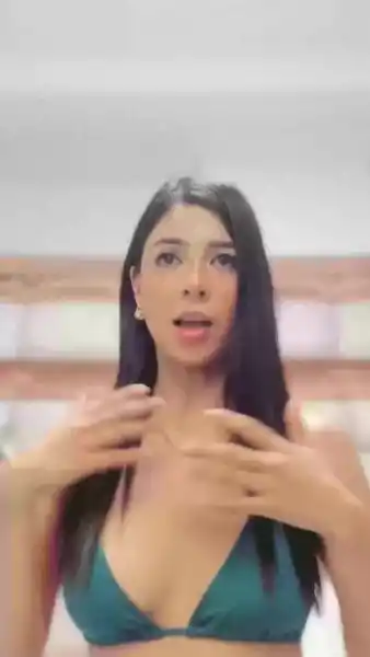 Watch the stunning model in this captivating performance, showcasing her allure and charm in high definition.