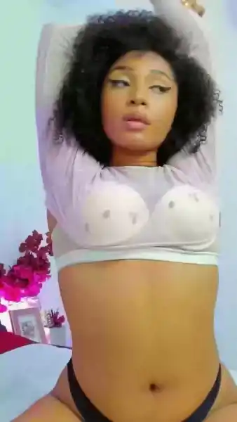 Catch a glimpse of the model's seductive moves in this captivating short clip.